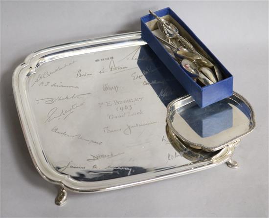 A 1960s silver salver engraved with signatures, ten small silver spoons and a small silver dish.